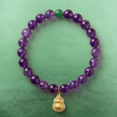 AETHER Key: AWARENESS Uruguay amethyst bracelet, deep purple crystal beads with a green agate accent and a gold Wu Lou pendant, oriental minimalist aesthetic.